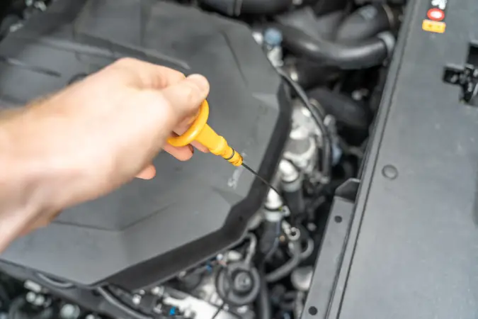 where should oil be on dipstick